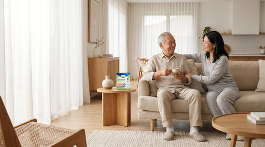 Elderly Australian man and family caregiver enjoying comfort and dignity at home with premium Japanese adult continence products supported by the CAPS subsidy program in Australia.